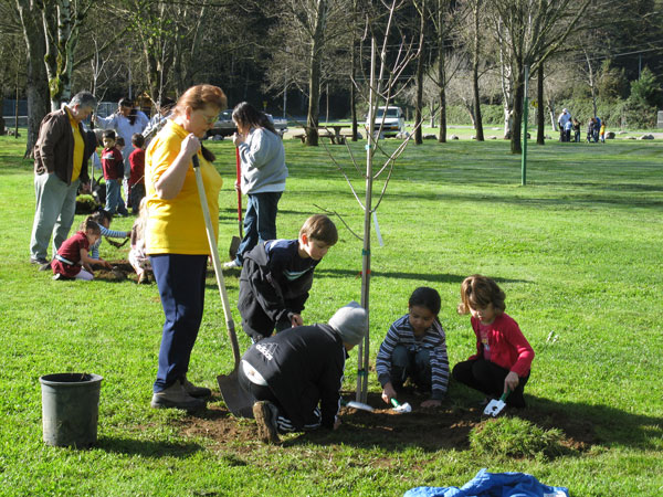Kids Planting A Tree